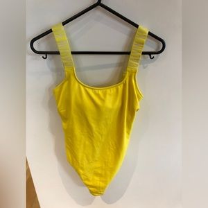 NEW Calvin Klein yellow swimsuit with logo on straps. Size S. Never worn/ new.